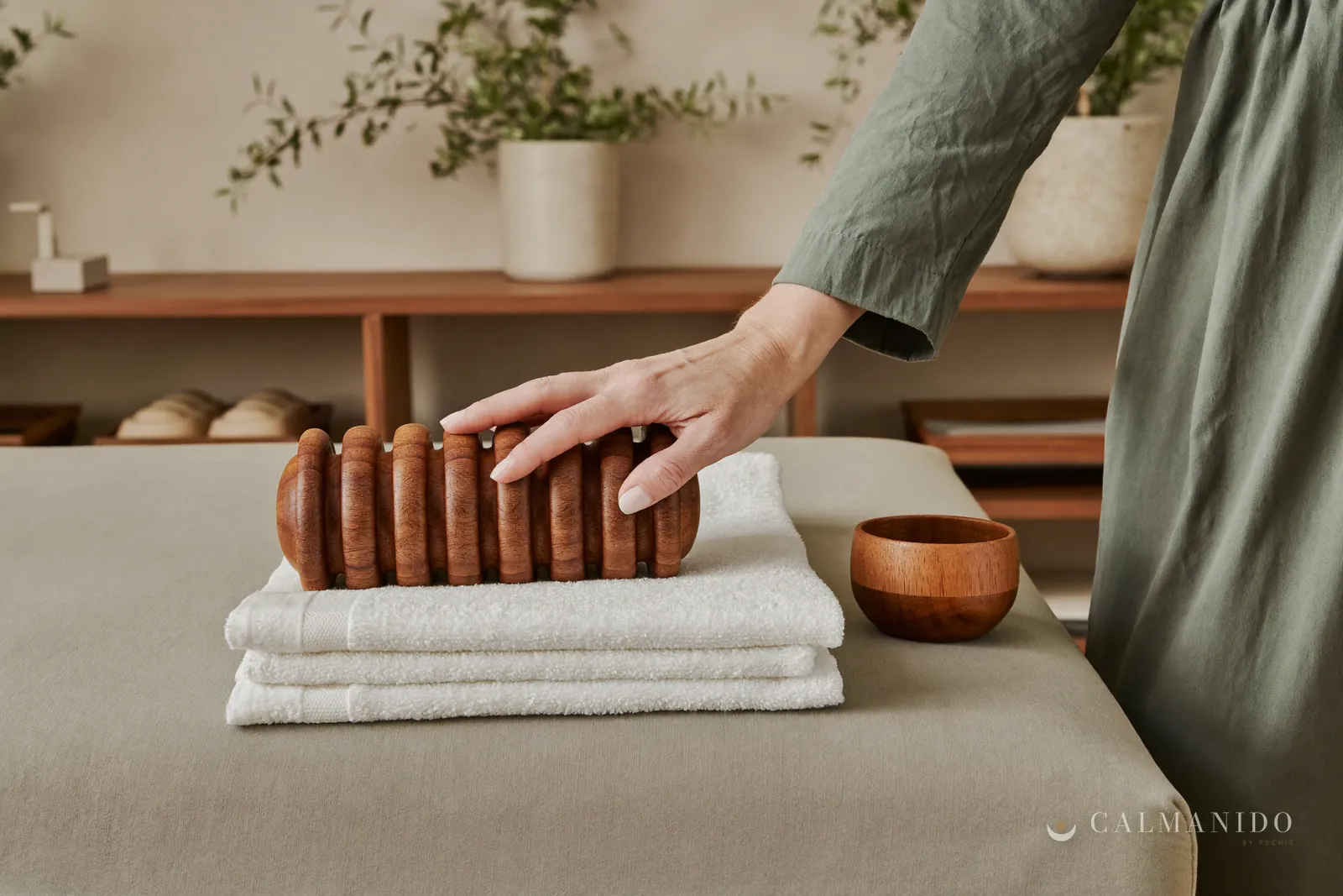 Wooden tools for wood therapy on a towel